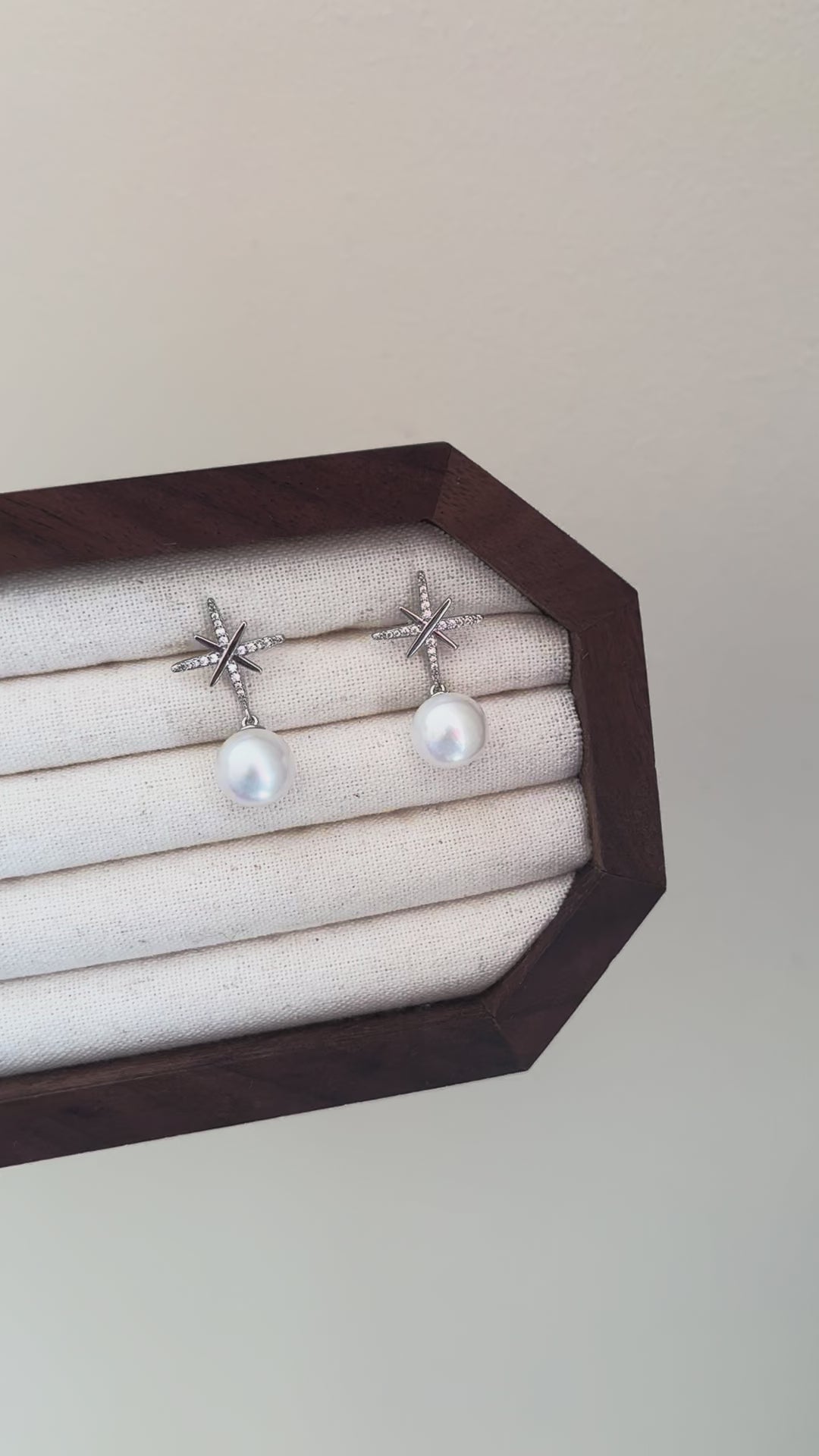 White pearl earring